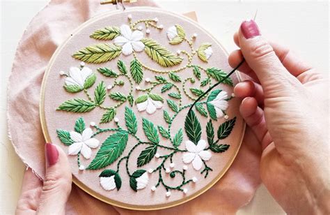 how to display embroidery: the art of telling stories through fabric